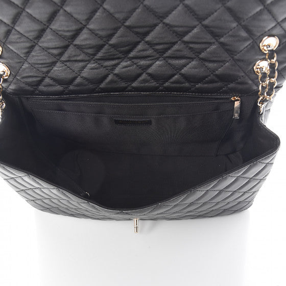 CHANEL Black Quilted Leather Jumbo Travel Flap Shoulder Bag
